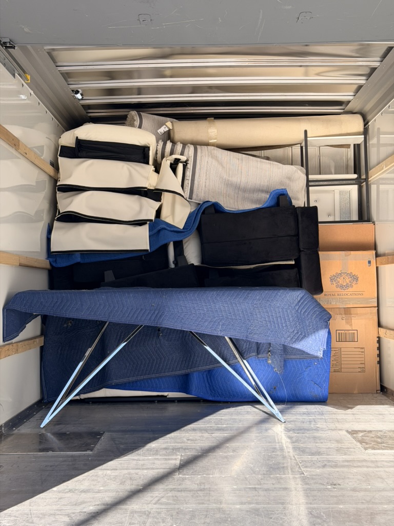 Toro Movers crew organizing a Haines City family move into a truck